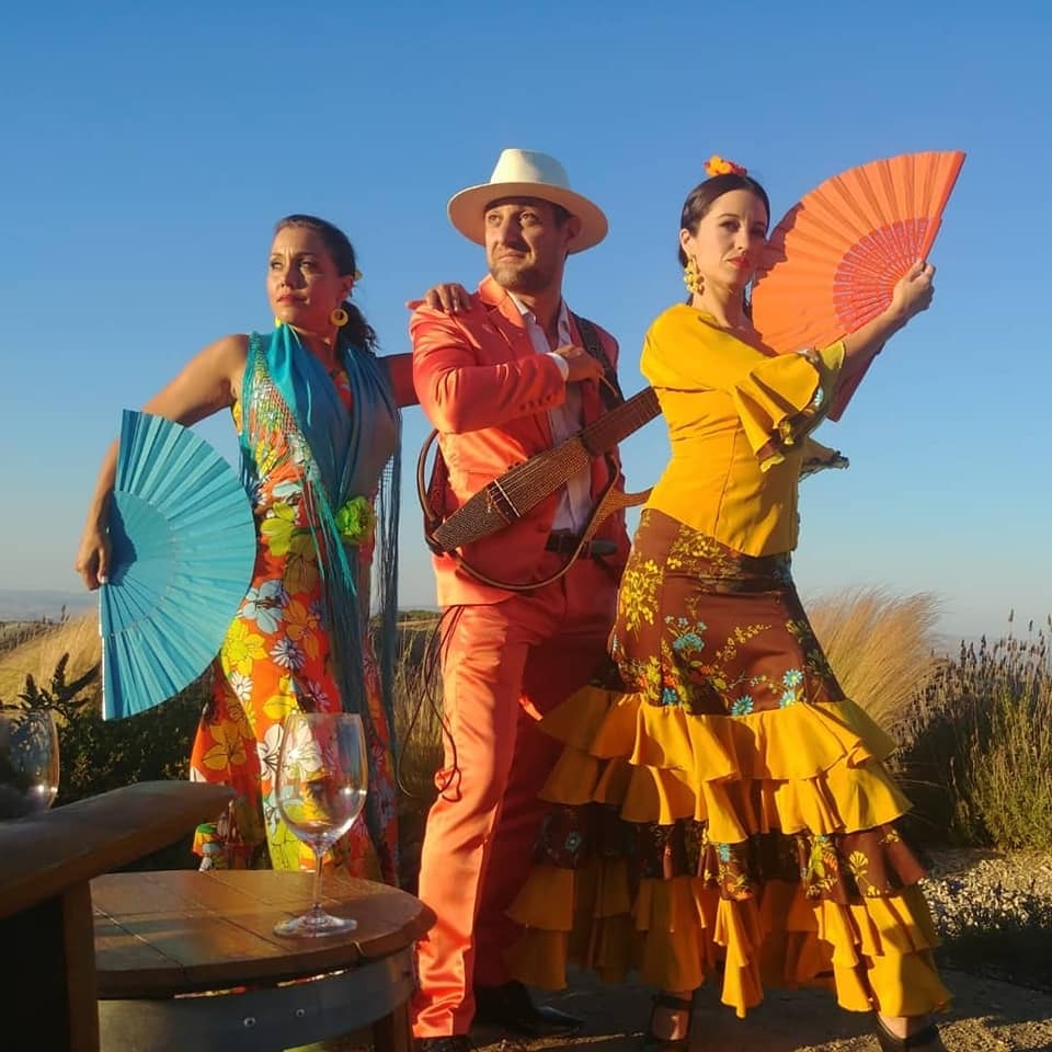 Flamenco Tropical trio performers with fans