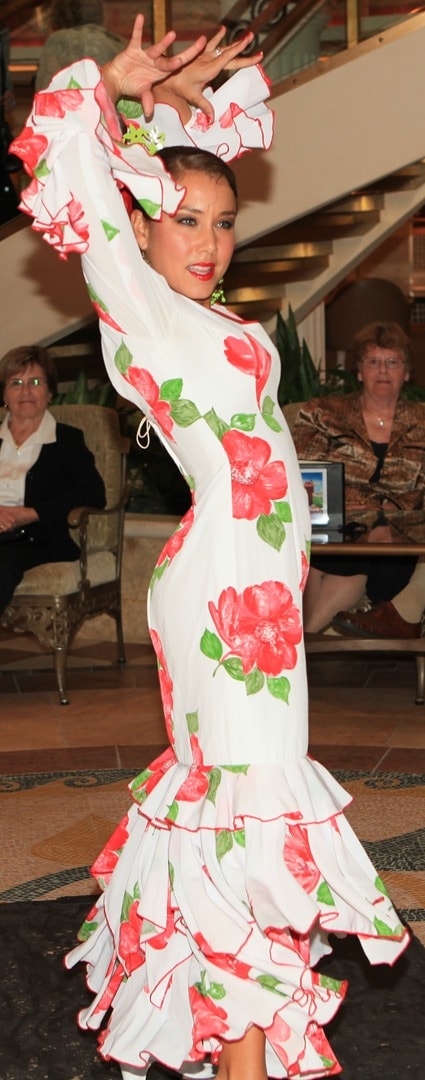 Flamenco dancer in white floral dress